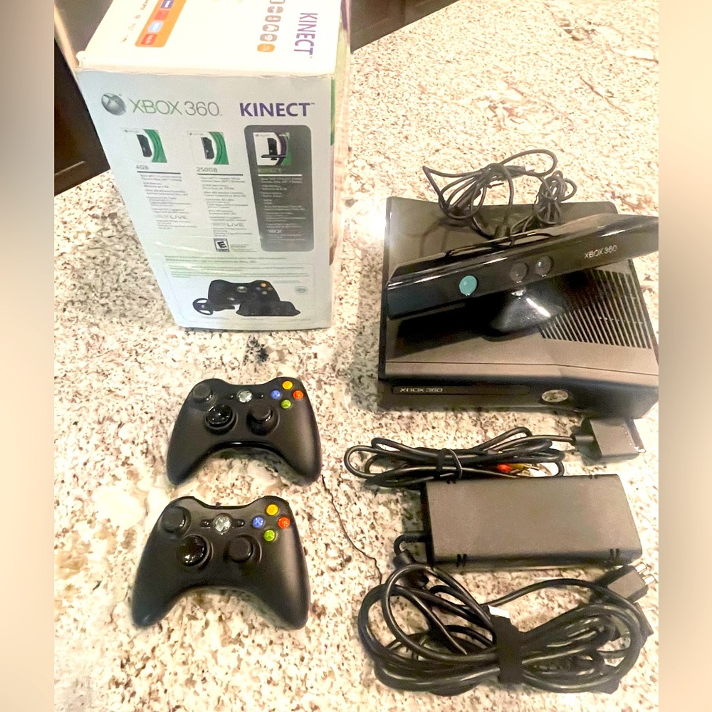 Xbox 360 4GB Kinect Bundle. Xbox 360 console, Kinect adapter, 2 wireless remotes